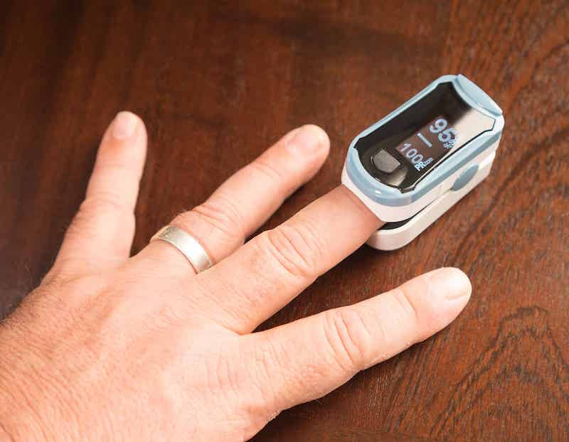 Close up of an oximeter on a finger